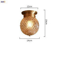 Plafonnier design à LED en métal et verre ambré
